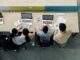 Team aziendale al lavoro su dati e processi con strumenti digitali